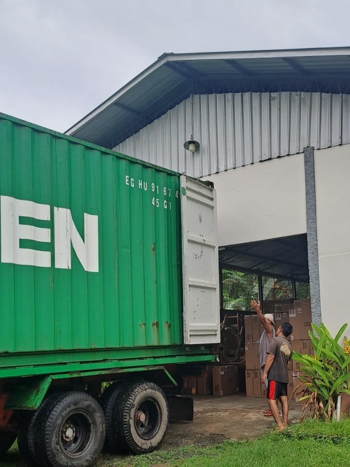 Furniwell export container loading and packing activity in Indonesia